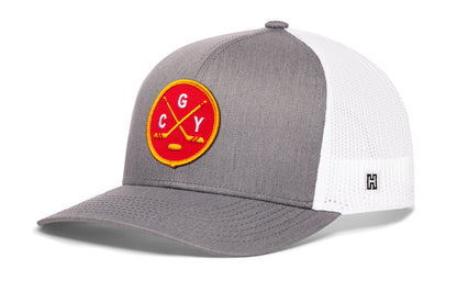 Calgary hockey trucker hat, gray-white snapback showing Haka brandmark on left side mesh.
Rep Calgary hockey.