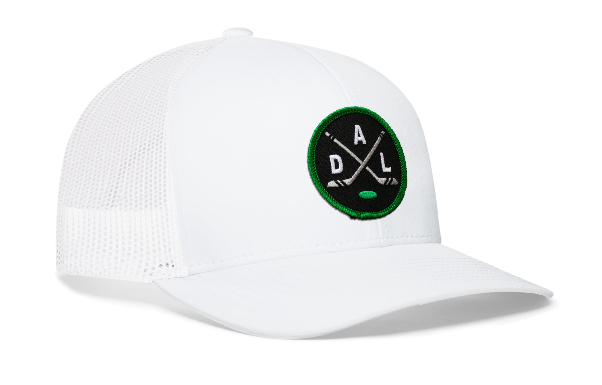 white trucker hat viewed from the right side, showcasing a black, green and gray hockey embroidered X patch prominently displayed on the front