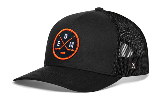 Edmonton hockey trucker hat, black snapback showing Haka brandmark on left side mesh of cap.
Rep Edmonton hockey.