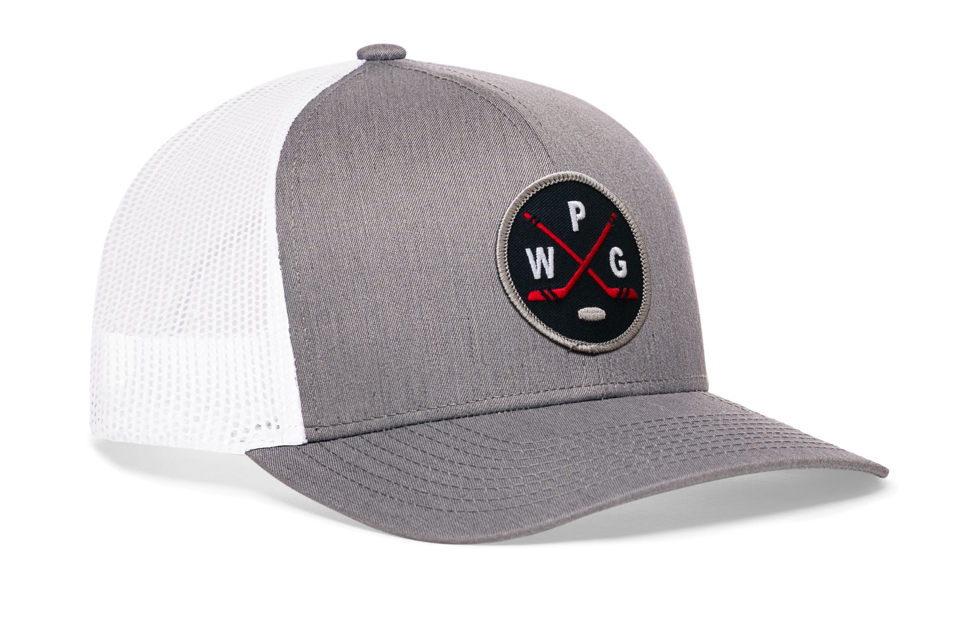 gray-white trucker hat viewed from the right side, showcasing a bold navy, red and gray embroidered X patch prominently displayed on the front