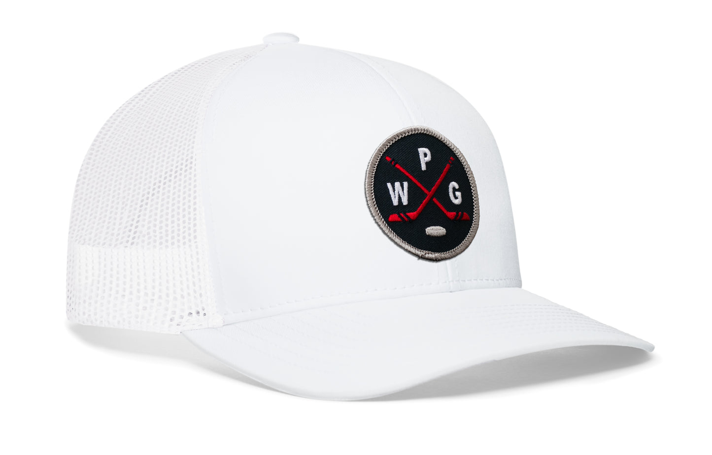 white trucker hat viewed from the right side, showcasing a navy, red and gray hockey embroidered X patch prominently displayed on the front