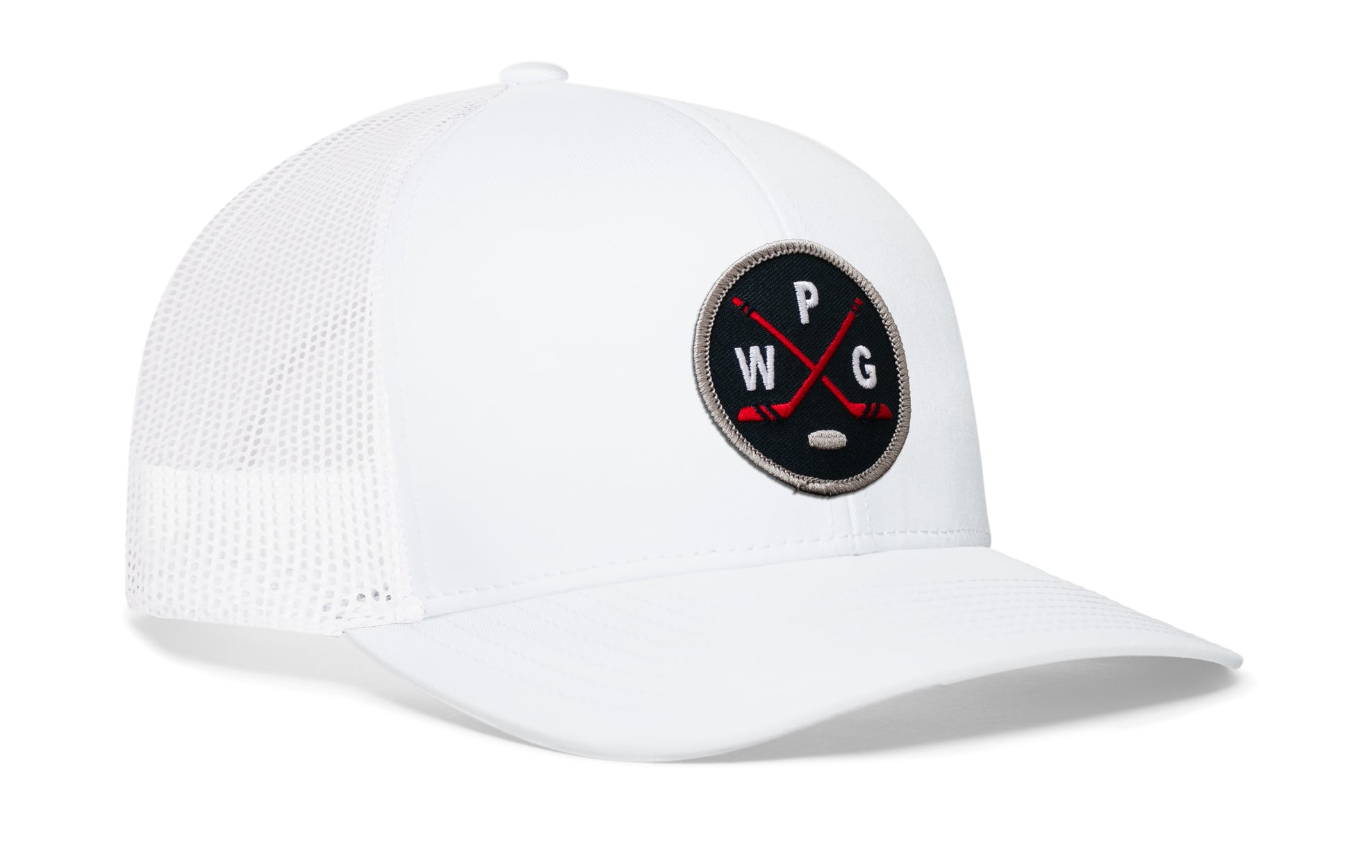 white trucker hat viewed from the right side, showcasing a navy, red and gray hockey embroidered X patch prominently displayed on the front
