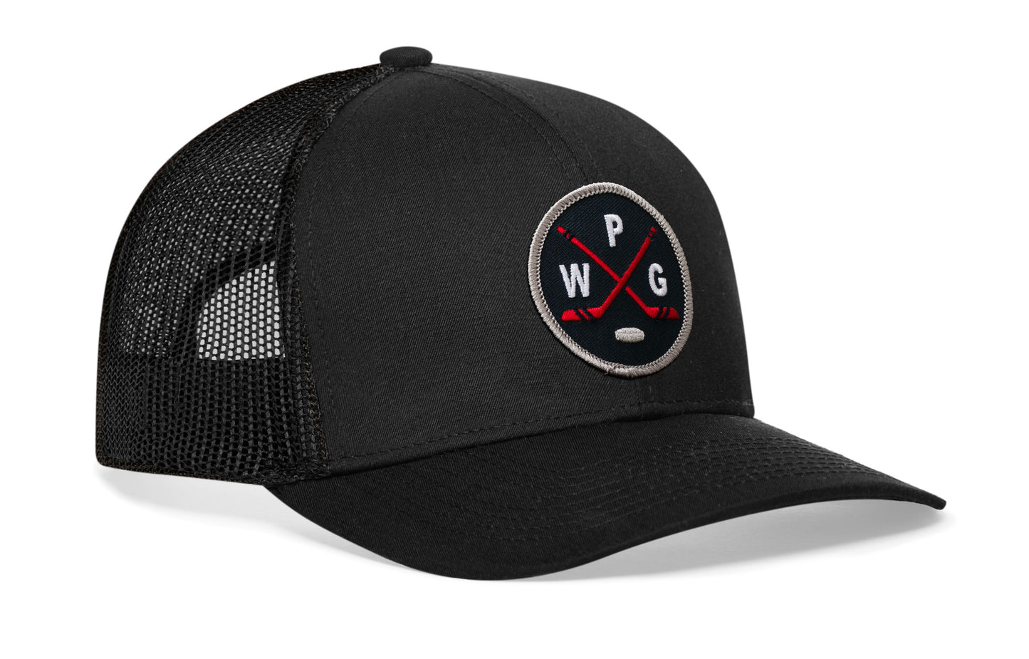 black trucker hat viewed from the right side, showcasing a navy, red and gray hockey embroidered X patch prominently displayed on the front