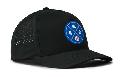black performance 5-panel hat viewed from the right side, showcasing a bold royal and columbia blue pvc patch prominently displayed on the front