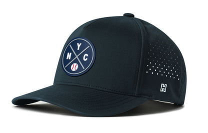 New York Baseball Performance 5-Panel Hat, navy snapback showing Haka brandmark on left side of cap.
New York.