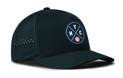 navy performance 5-panel hat viewed from the right side, showcasing a bold navy and gray pvc patch prominently displayed on the front