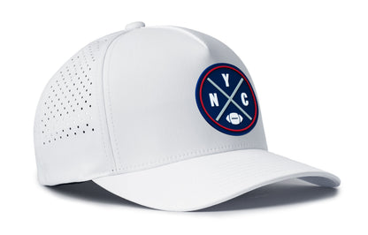 white trucker hat viewed from the right side, showcasing a bold navy, red and gray pvc patch prominently displayed on the front