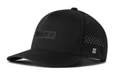 HAKA Performance 5-Panel Hat, black snapback showing Haka brandmark on left side of cap.