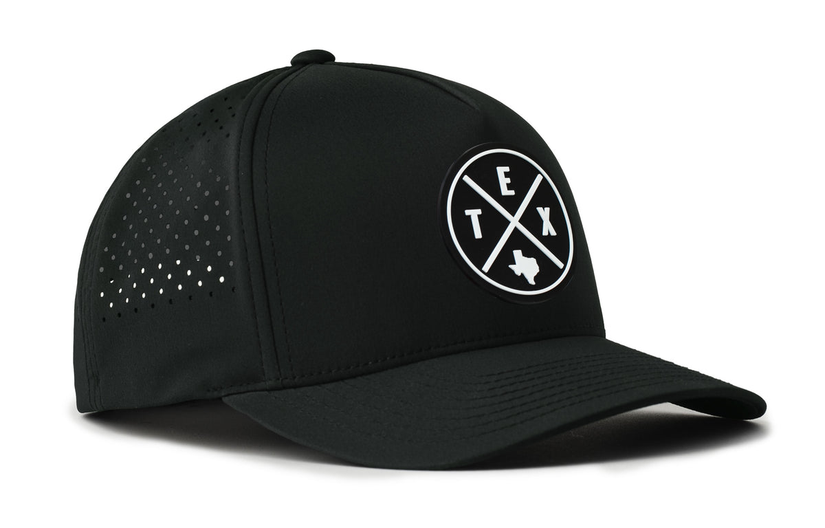 black trucker hat viewed from the right side, showcasing a bold black and white pvc patch prominently displayed on the front