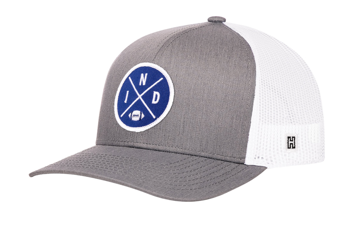 Indianapolis Football Trucker Hat, gray-white snapback showing Haka brandmark on left side of cap.
