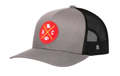 Kansas City Football Trucker Hat, gray-black snapback showing Haka brandmark on left side of cap.