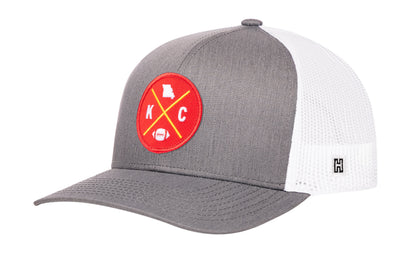 Kansas City Football Trucker Hat, gray-white snapback showing Haka brandmark on left side of cap.