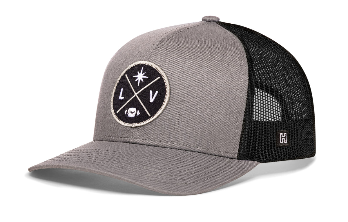 Las Vegas Football Trucker Hat, gray-black snapback showing Haka brandmark on left side of cap.