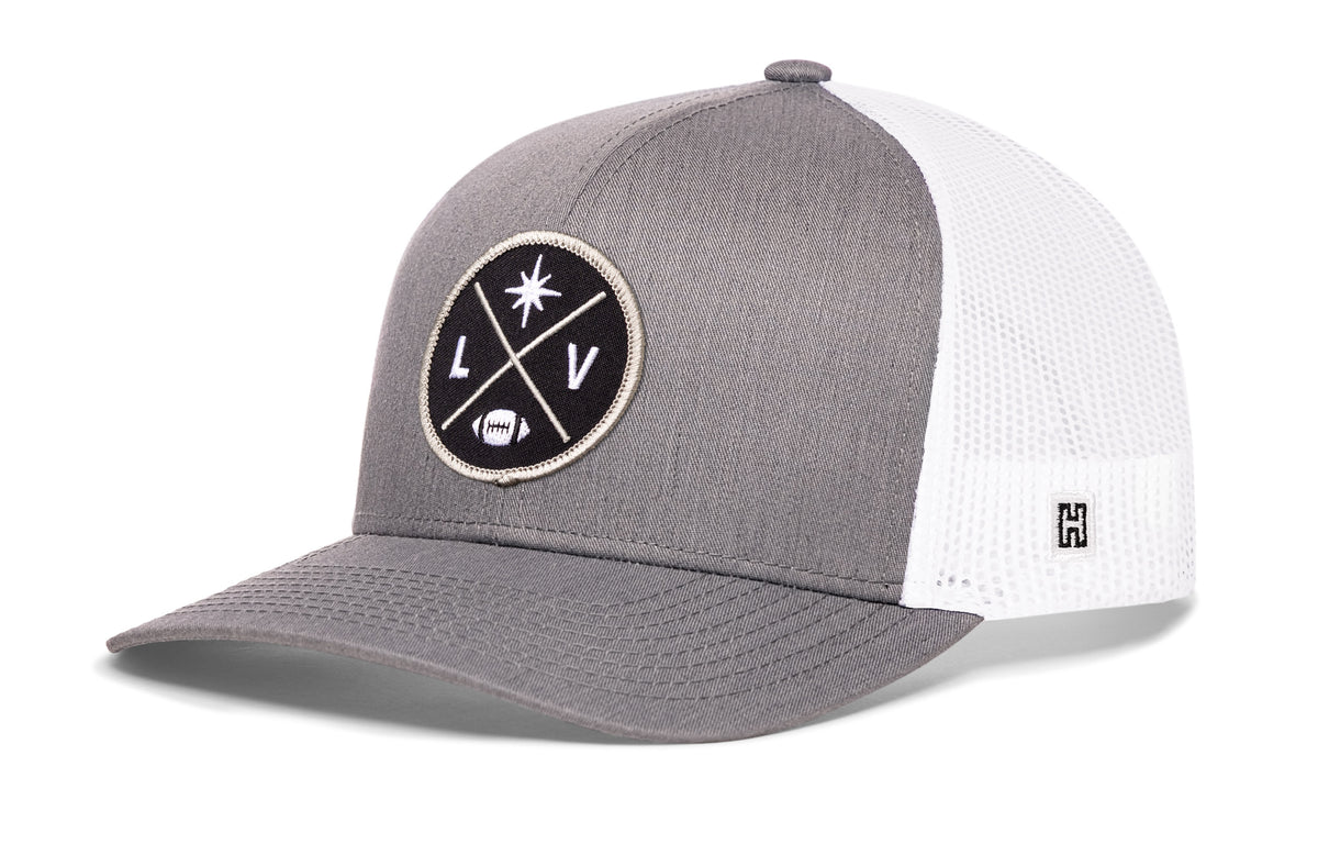 Las Vegas Football Trucker Hat, gray-white snapback showing Haka brandmark on left side of cap.