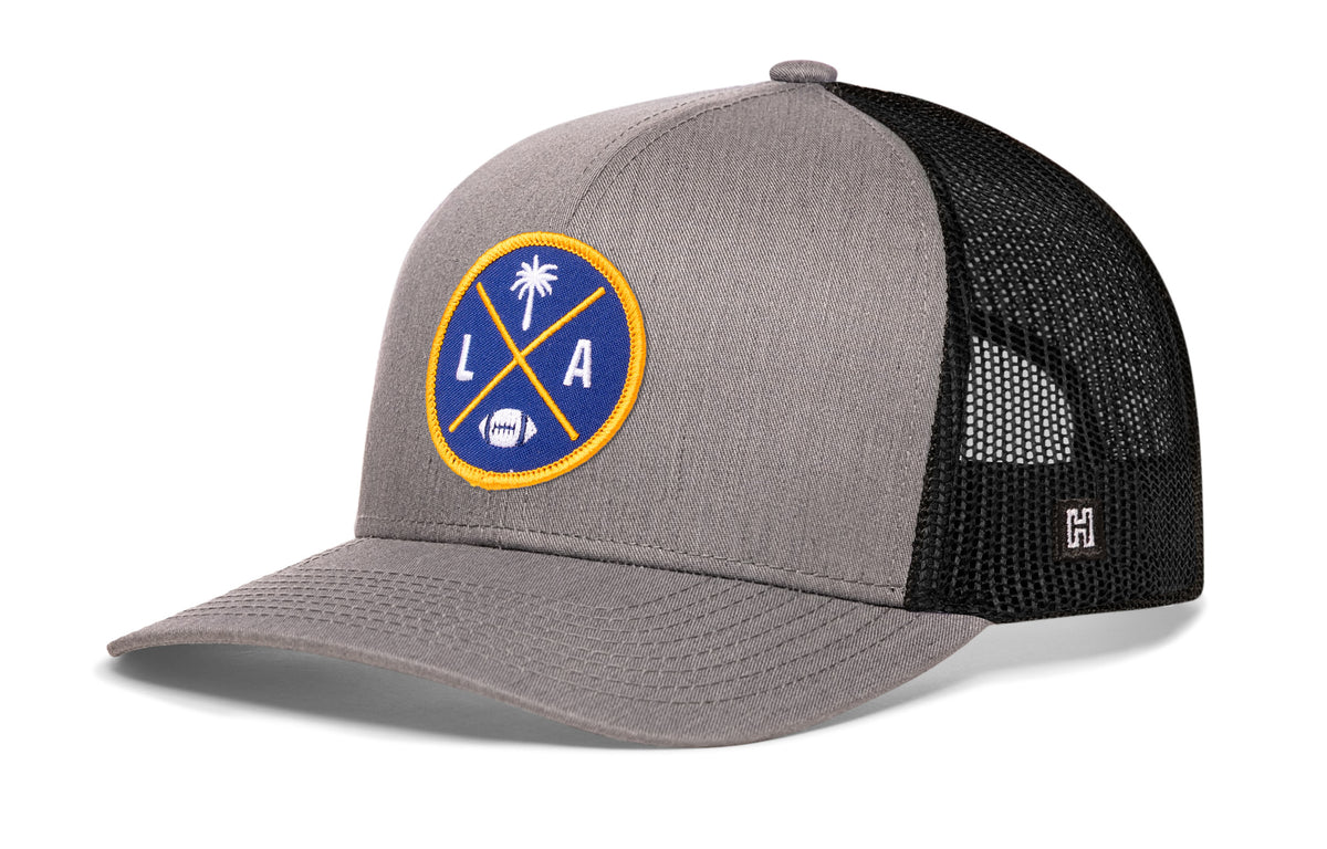 Los Angeles Football Trucker Hat, gray-black snapback showing Haka brandmark on left side of cap.