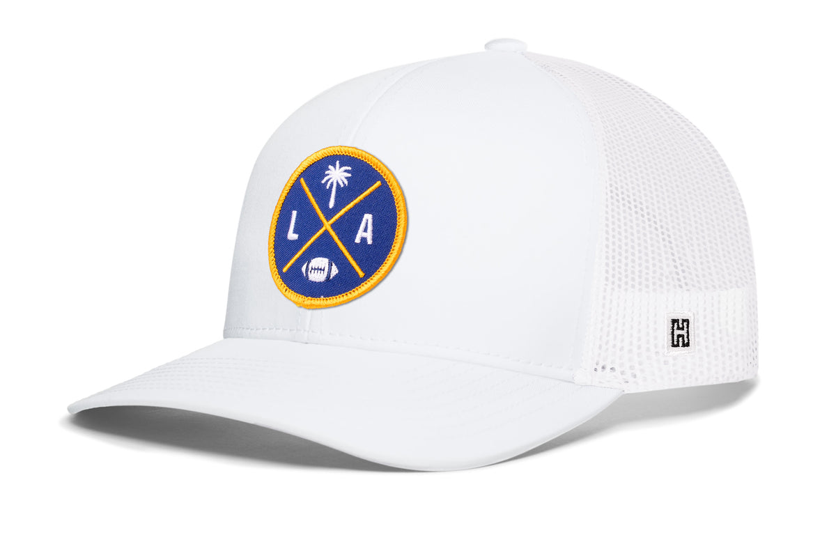 Los Angeles Football Trucker Hat, white snapback showing Haka brandmark on left side of cap.