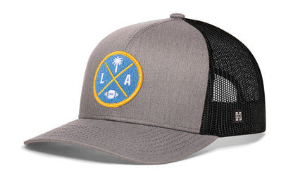 Los Angeles Football Trucker Hat, gray-black snapback showing Haka brandmark on left side of cap.