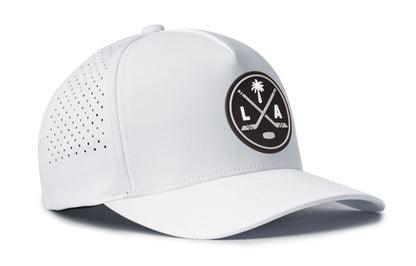 white performance 5-panel hat viewed from the right side, showcasing a bold black and gray pvc patch prominently displayed on the front