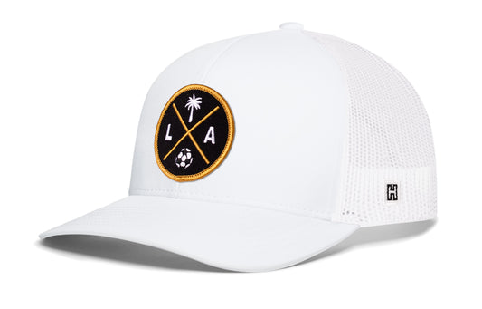 Los Angeles Soccer Trucker Hat, white snapback showing Haka brandmark on left side of cap.
