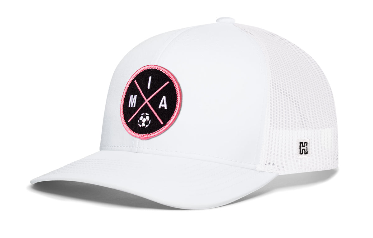 Miami Soccer Trucker Hat, white snapback showing Haka brandmark on left side of cap.