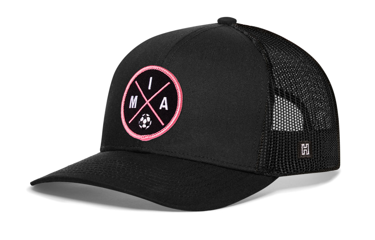 Miami Soccer Trucker Hat, black snapback showing Haka brandmark on left side of cap.