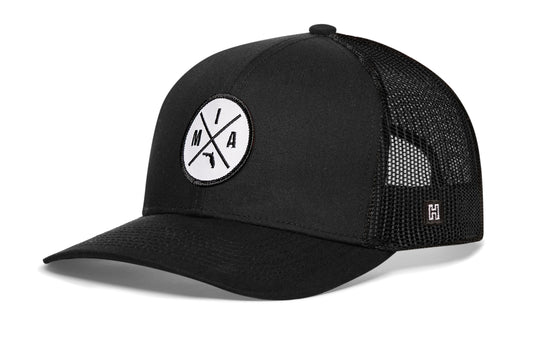 Miami Trucker Hat, black snapback showing Haka brandmark on left side of cap.