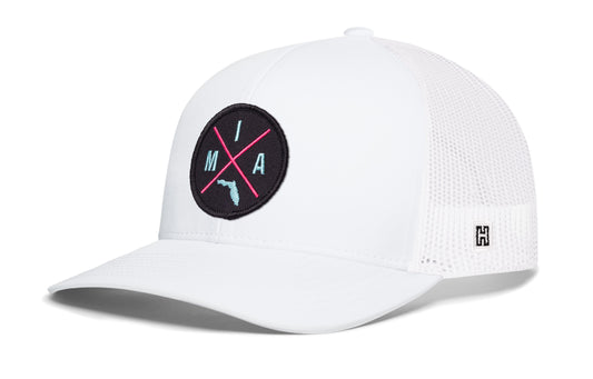 Miami Trucker Hat, white snapback showing Haka brandmark on left side of cap.