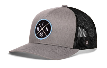 Minnesota Soccer Trucker Hat, gray-black snapback showing Haka brandmark on left side of cap.