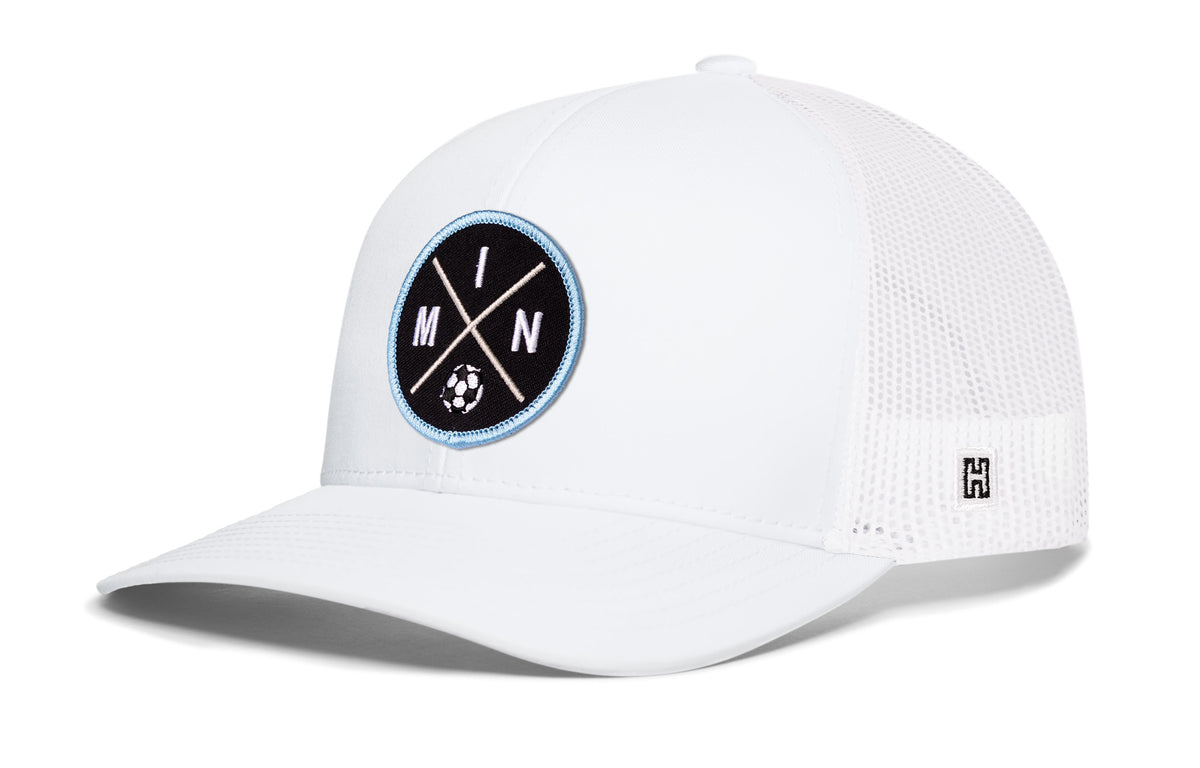 Minnesota Soccer Trucker Hat, white snapback showing Haka brandmark on left side of cap.
