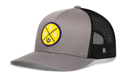 Nashville Soccer Trucker Hat, gray-black snapback showing Haka brandmark on left side of cap.