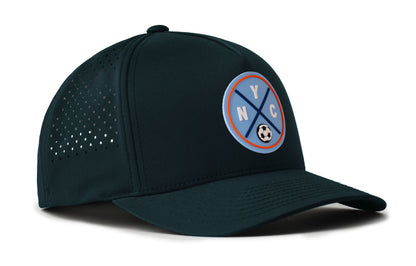 navy performance 5-panel hat viewed from the right side, showcasing a bold sky blue and orange pvc patch prominently displayed on the front
