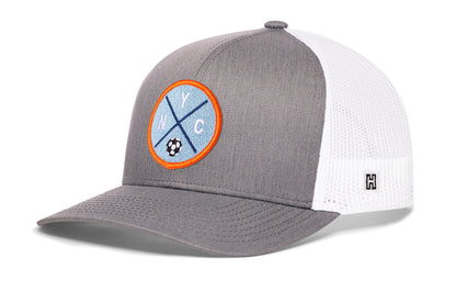 New York City Soccer Trucker Hat, gray-white snapback showing Haka brandmark on left side of cap.