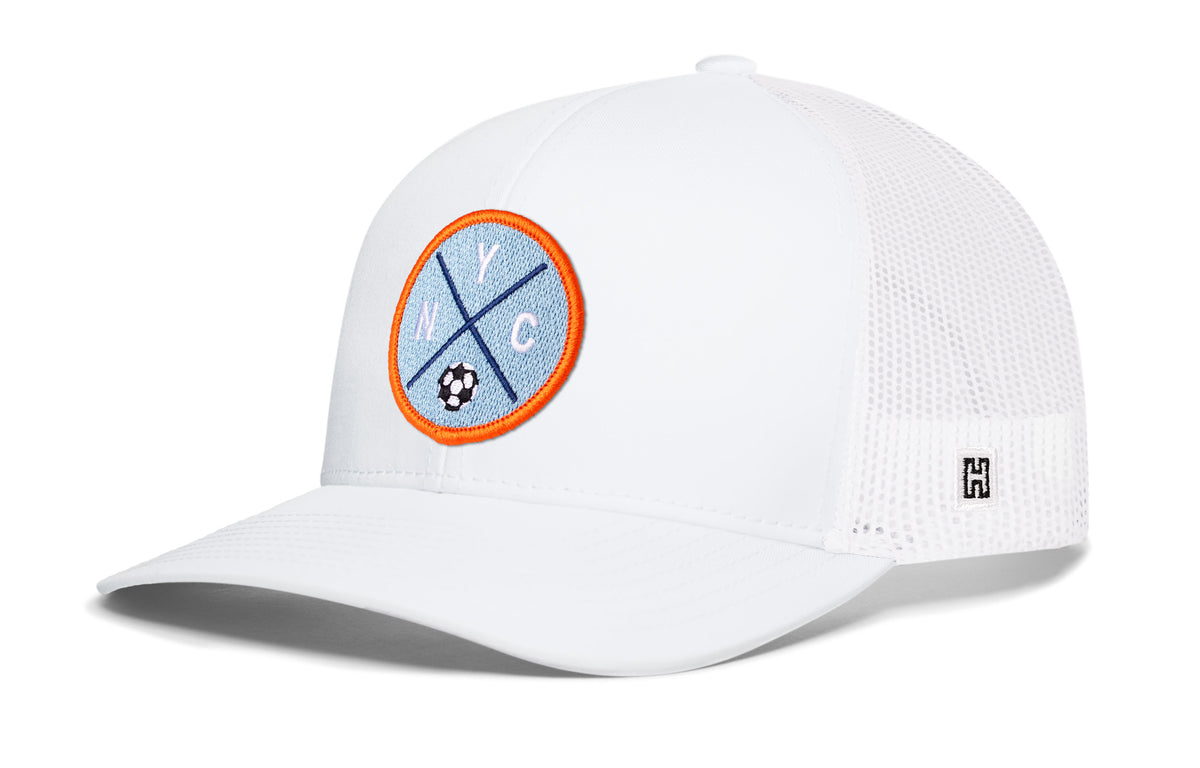 New York City Soccer Trucker Hat, white snapback showing Haka brandmark on left side of cap.