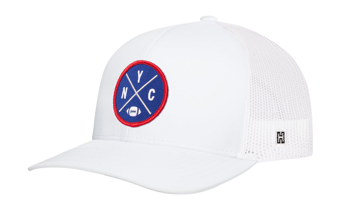 New York Football Trucker Hat, white snapback showing Haka brandmark on left side of cap.