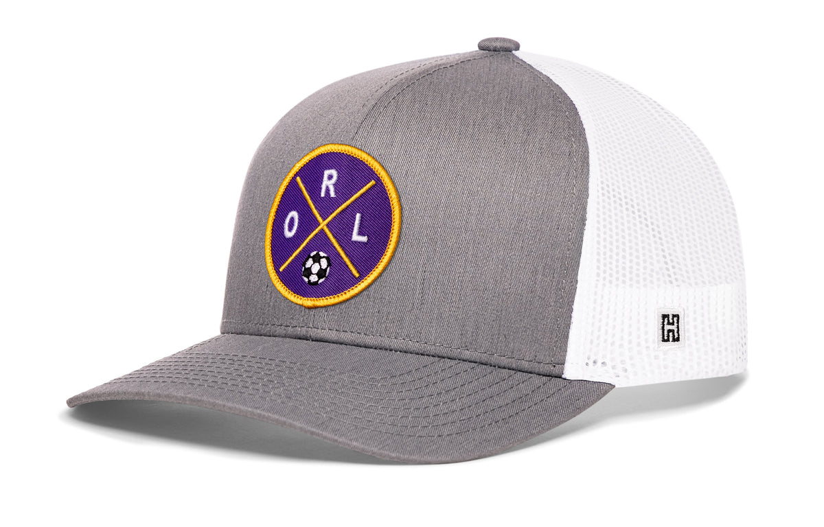 Orlando Soccer Trucker Hat, gray-white snapback showing Haka brandmark on left side of cap.
