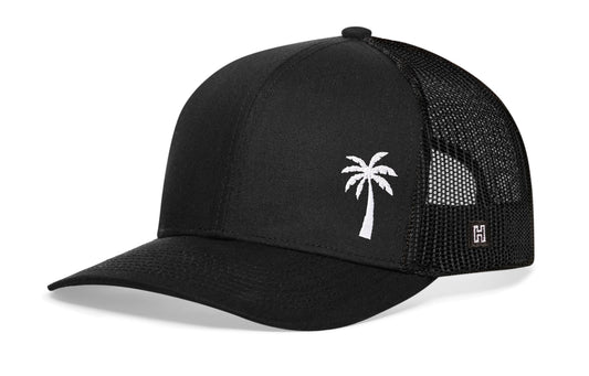 Palm Tree Trucker Hat, black snapback showing Haka brandmark on left side of cap.
