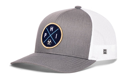 Philadelphia Soccer Trucker Hat, gray-white snapback showing Haka brandmark on left side of cap.