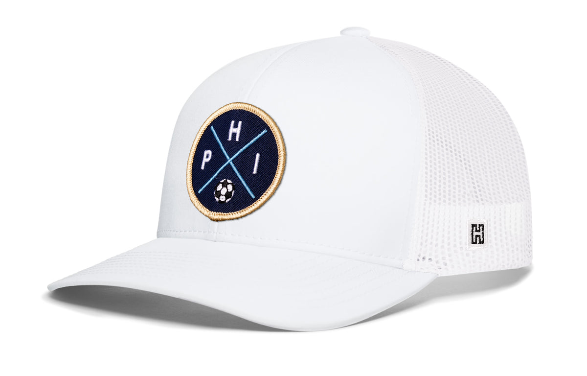 Philadelphia Soccer Trucker Hat, white snapback showing Haka brandmark on left side of cap.