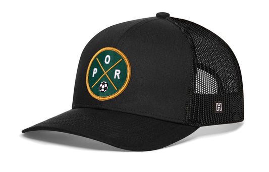 Portland Soccer Trucker Hat, black snapback showing Haka brandmark on left side of cap.