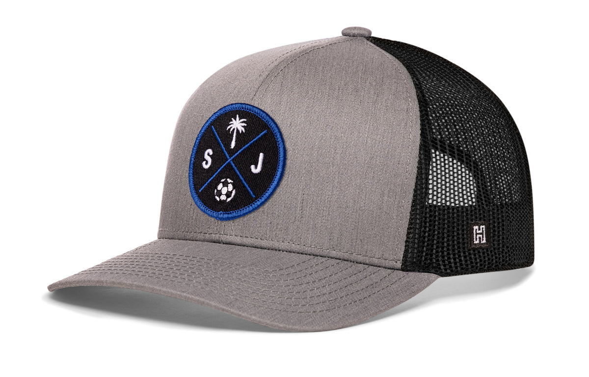 San Jose Soccer Trucker Hat, gray-black snapback showing Haka brandmark on left side of cap.