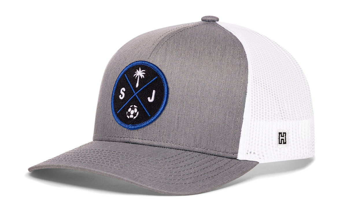 San Jose Soccer Trucker Hat, gray-white snapback showing Haka brandmark on left side of cap.