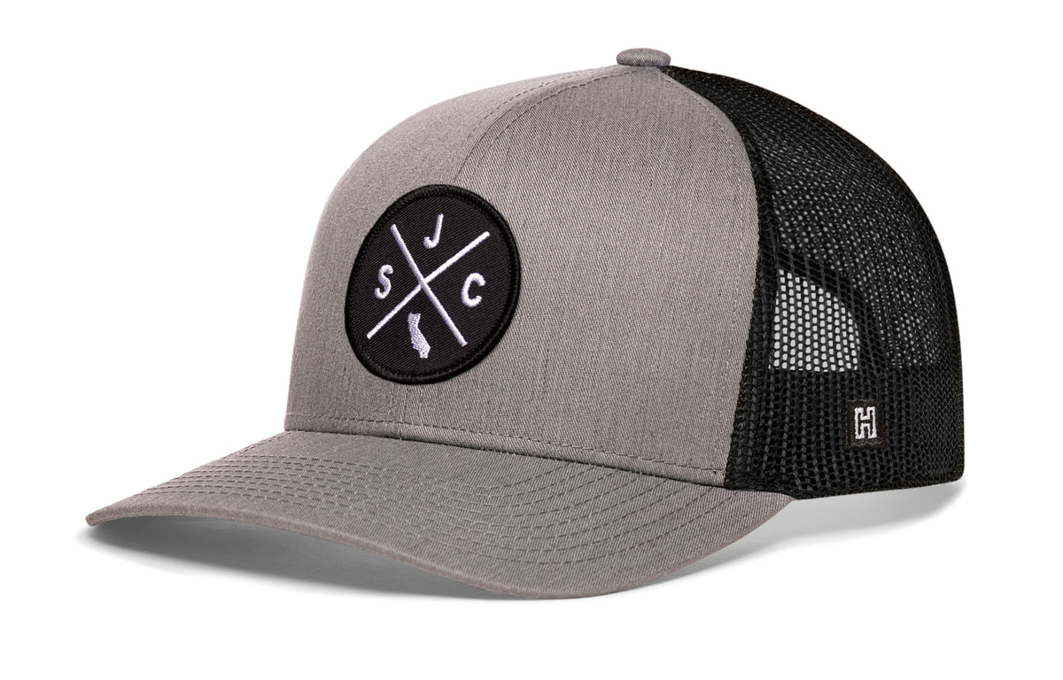 San Jose Trucker Hat, gray-black snapback showing Haka brandmark on left side of cap.