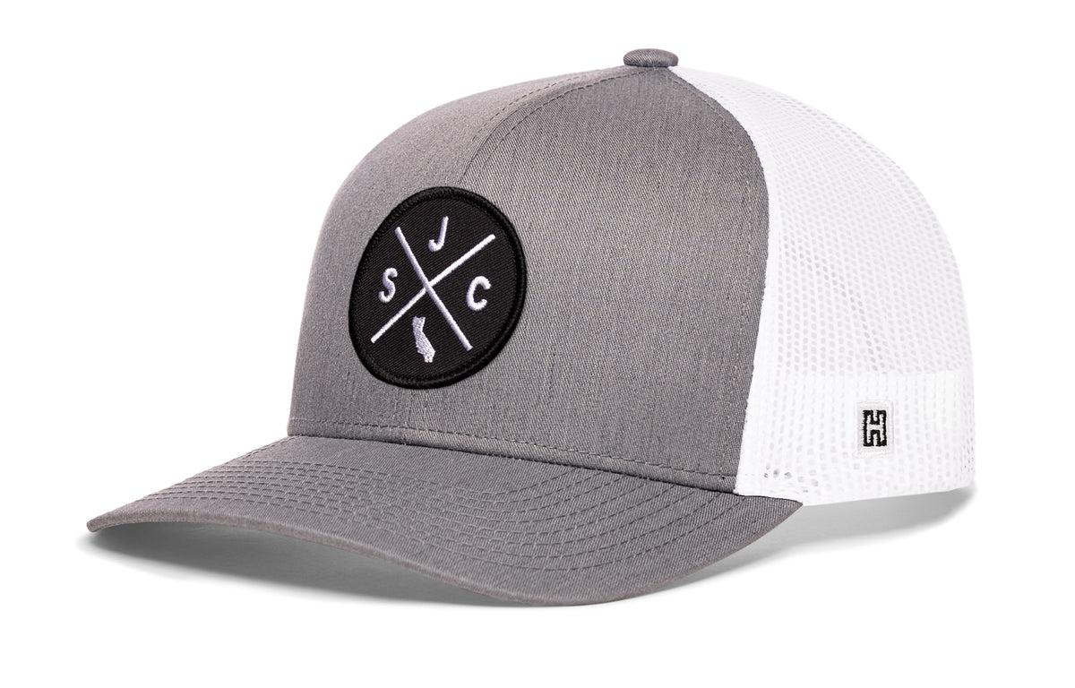 San Jose Trucker Hat, gray-white snapback showing Haka brandmark on left side of cap.