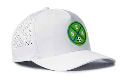 white performance 5-panel hat viewed from the right side, showcasing a bold green and blue pvc patch prominently displayed on the front