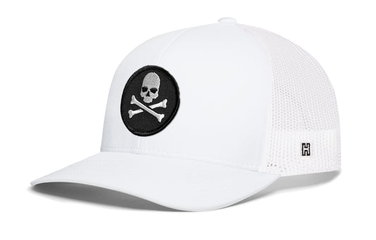 Skull and Crossbones Trucker Hat, white snapback showing Haka brandmark on left side of cap.