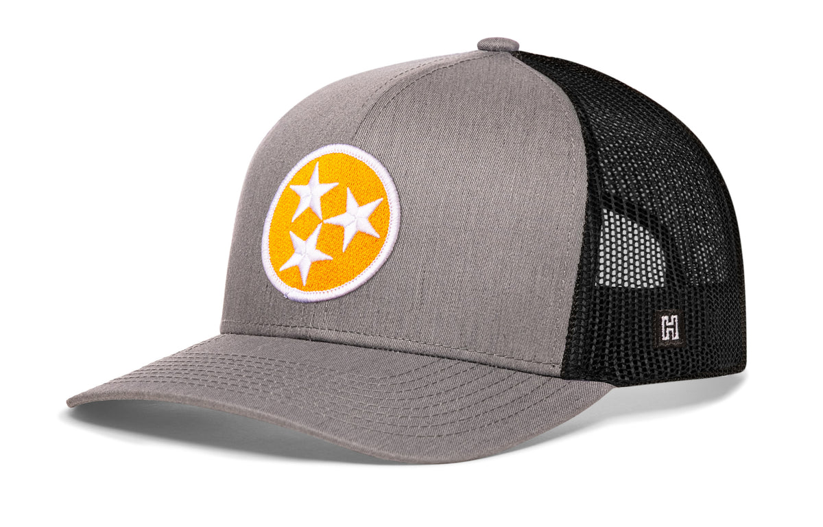 Tennessee Flag Trucker Hat, gray-black snapback showing Haka brandmark on left side of cap.