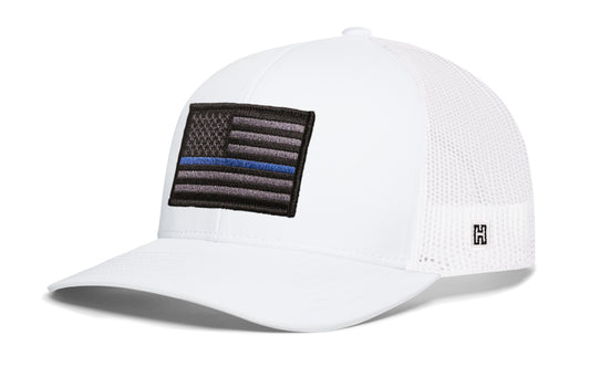 Thin Blue Line Trucker Hat, white snapback showing Haka brandmark on left side of cap.