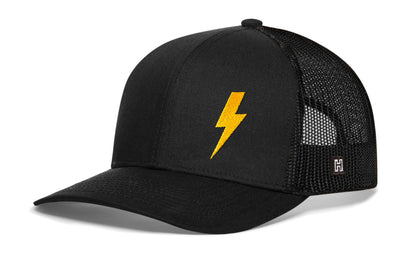 Thunder Bolt Trucker Hat, black snapback showing Haka brandmark on left side of cap.
