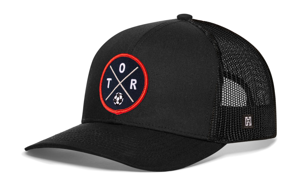 Toronto Soccer Trucker Hat, black snapback showing Haka brandmark on left side of cap.