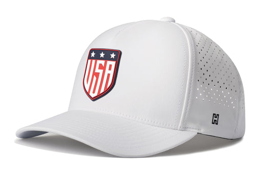 USA Shield Performance 5-Panel Hat, navy snapback showing Haka brandmark on left side of cap.